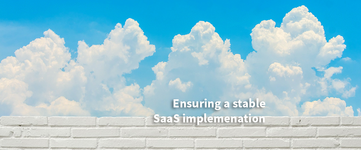 Clouds over a wall - ensuring a stable SaaS implementation
